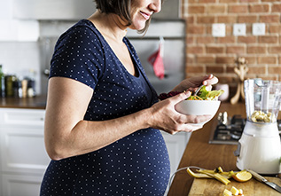 Pregnant Lady Eating Salad